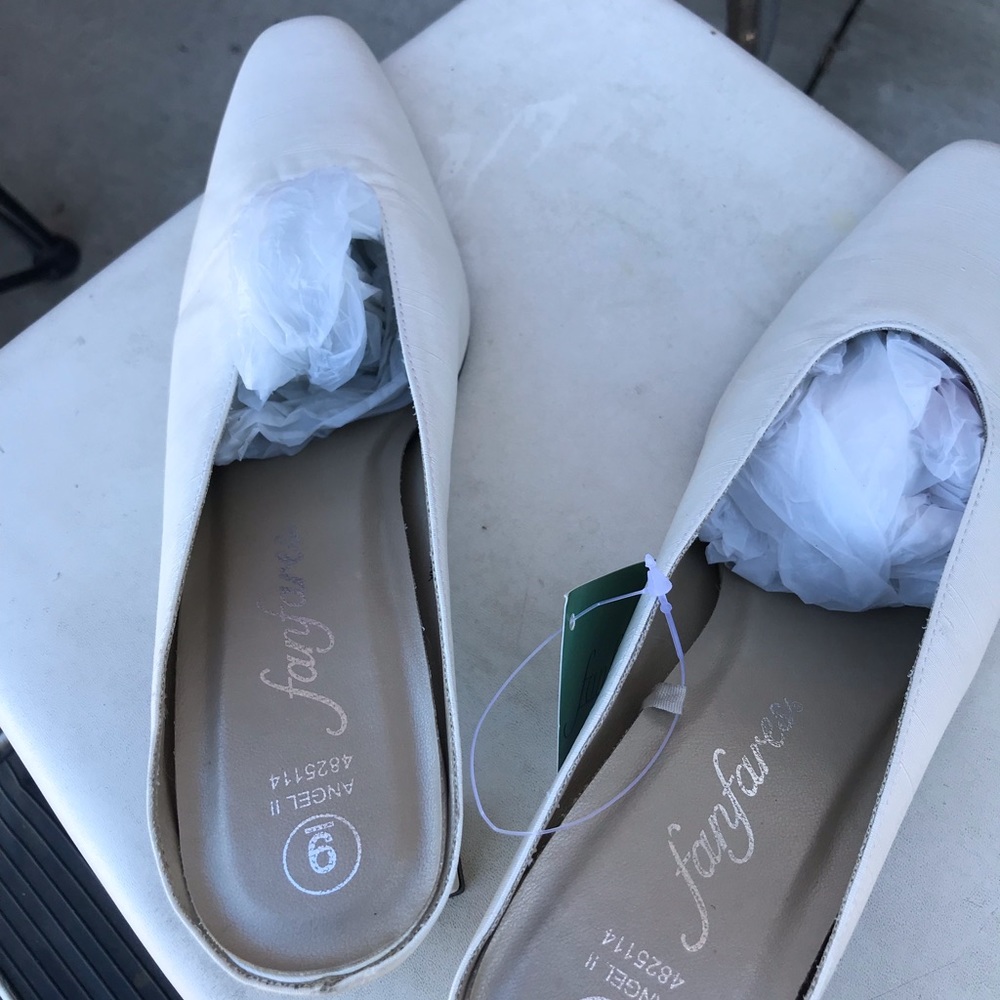 Brand new Slip on pumps with tags